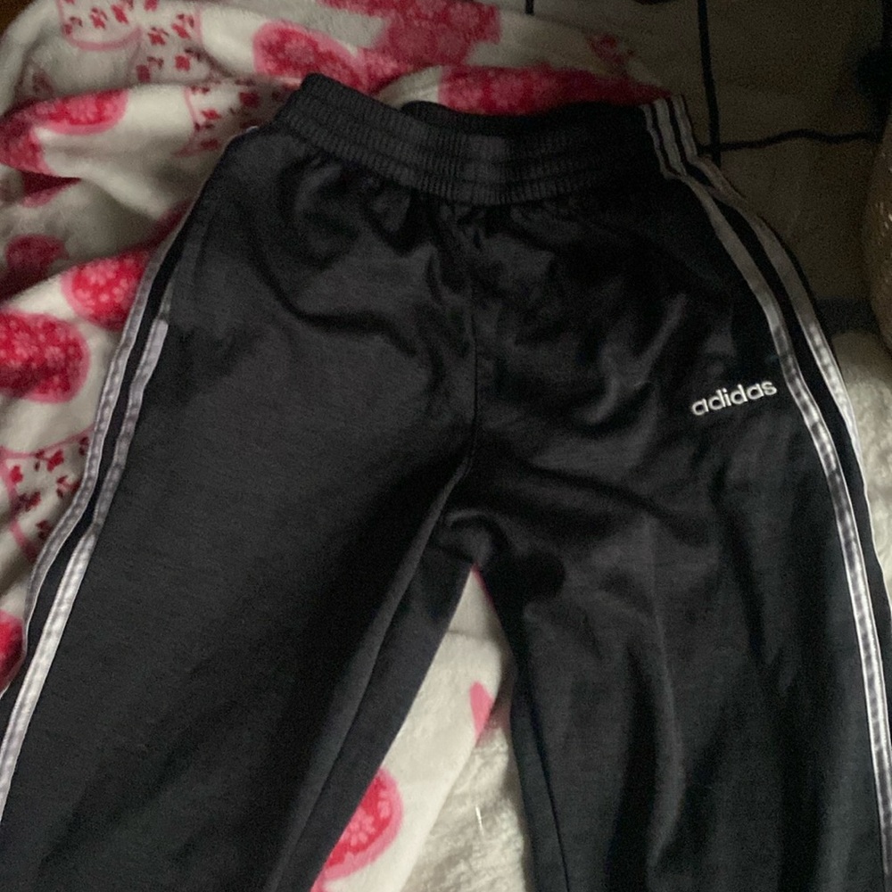 Black Adidas sweats for the white stripes fabric cuffs, pockets, kids